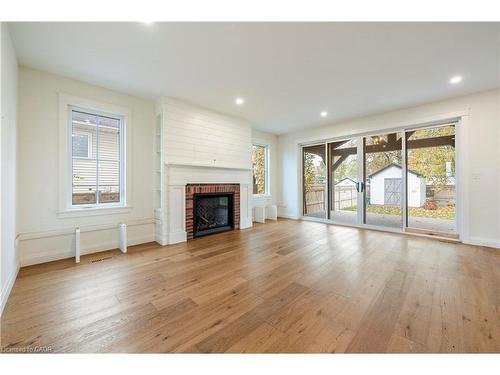 3922 Twenty Third Street, Lincoln, ON - Indoor Photo Showing Living Room With Fireplace
