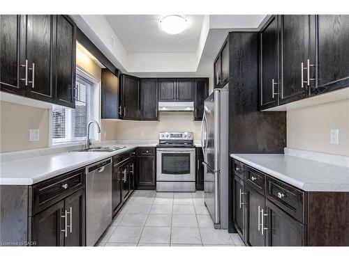 H3-70 Willowrun Drive, Kitchener, ON - Indoor Photo Showing Kitchen With Double Sink