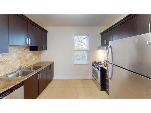 405-1544 King Street E, Hamilton, ON - Indoor Photo Showing Kitchen With Stainless Steel Kitchen With Double Sink