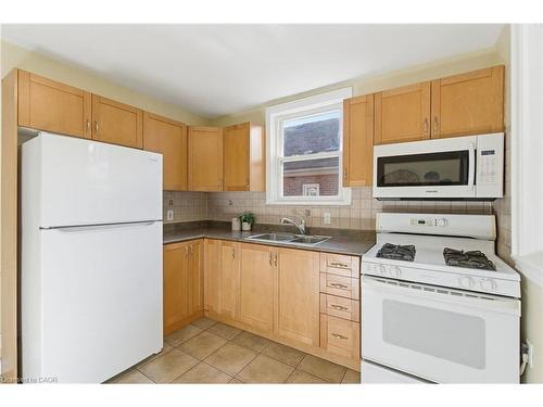 76 East 15Th Street, Hamilton, ON - Indoor Photo Showing Kitchen With Double Sink