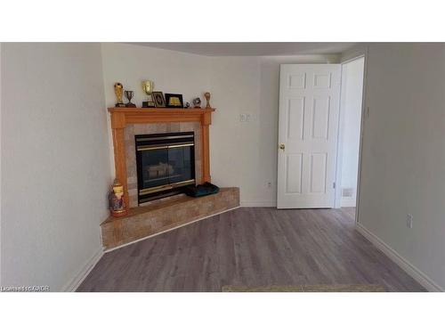 Kitchener, ON - Indoor Photo Showing Living Room With Fireplace