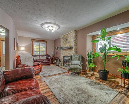 81 Beechwood Avenue, Hamilton, ON - Indoor Photo Showing Living Room With Fireplace