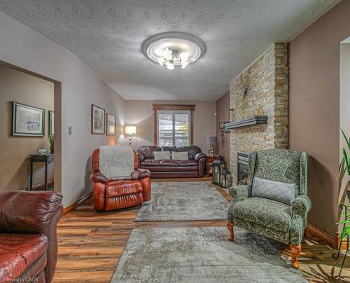 81 Beechwood Avenue, Hamilton, ON - Indoor Photo Showing Living Room With Fireplace