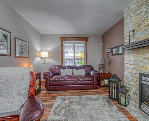 81 Beechwood Avenue, Hamilton, ON - Indoor Photo Showing Living Room With Fireplace