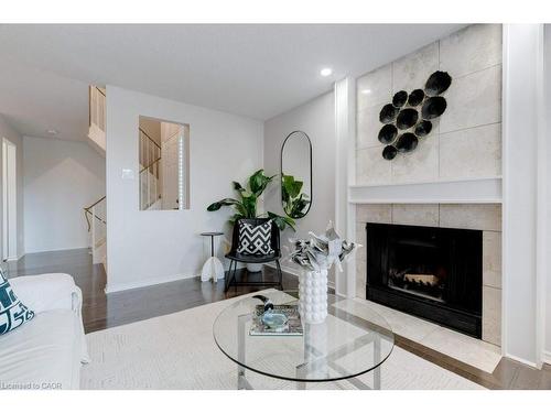 4-1509 Upper Middle Road, Burlington, ON - Indoor Photo Showing Living Room With Fireplace