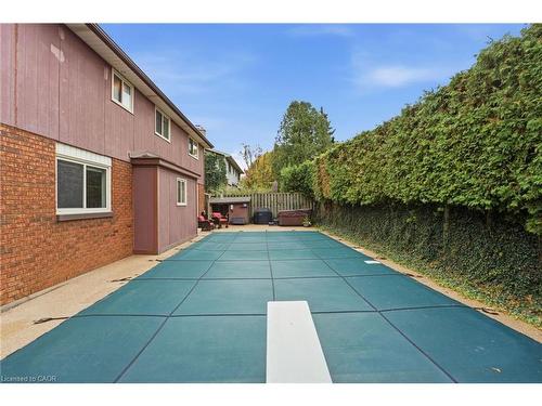 668 Tomahawk Crescent, Ancaster, ON - Outdoor With In Ground Pool