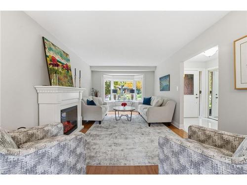 668 Tomahawk Crescent, Ancaster, ON - Indoor Photo Showing Living Room With Fireplace