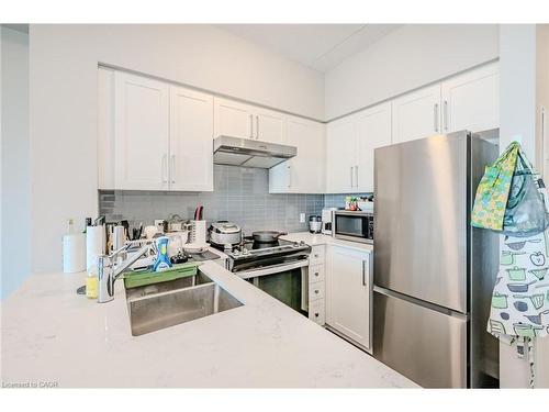 610-15 Queen Street S, Hamilton, ON - Indoor Photo Showing Kitchen With Stainless Steel Kitchen With Double Sink