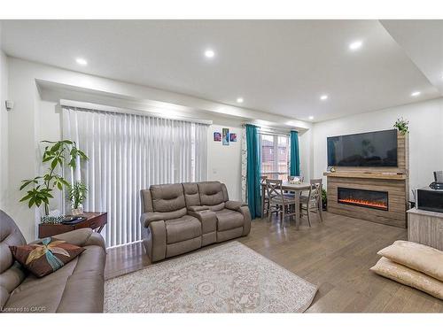 220 Bedrock Drive, Hamilton, ON - Indoor Photo Showing Living Room With Fireplace