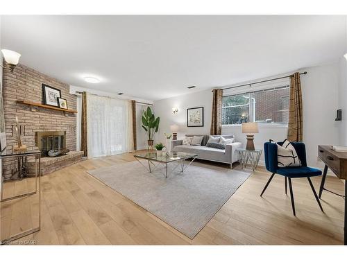 131 Woodbend Crescent, Waterloo, ON - Indoor Photo Showing Living Room With Fireplace