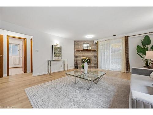 131 Woodbend Crescent, Waterloo, ON - Indoor Photo Showing Living Room With Fireplace