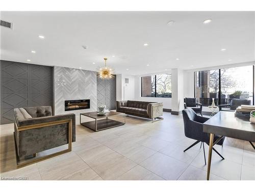 1609-1270 Maple Crossing Boulevard, Burlington, ON - Indoor With Fireplace