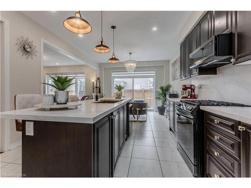 39 Mcwatters Street, Binbrook, ON - Indoor Photo Showing Kitchen With Upgraded Kitchen