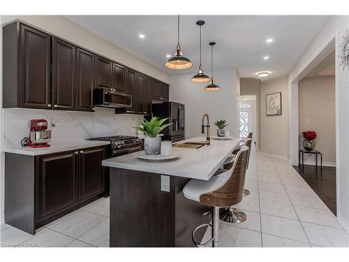 39 Mcwatters Street, Binbrook, ON - Indoor Photo Showing Kitchen With Upgraded Kitchen