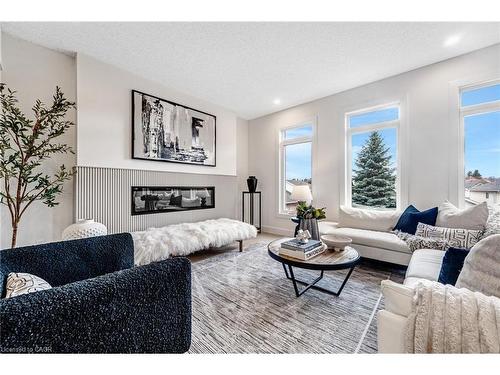 83 Dunnigan Drive, Kitchener, ON - Indoor Photo Showing Living Room With Fireplace