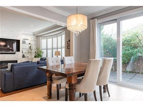2124 Blackforest Crescent, Oakville, ON - Indoor Photo Showing Dining Room With Fireplace