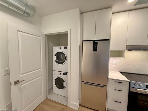 409-206 King Street W, Hamilton, ON - Indoor Photo Showing Laundry Room