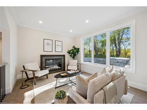 4 Winders Trail, Ingersoll, ON - Indoor Photo Showing Living Room With Fireplace