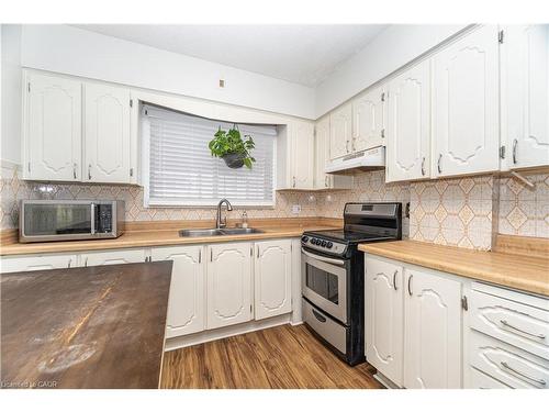 163 Connaught Avenue N, Hamilton, ON - Indoor Photo Showing Kitchen With Double Sink