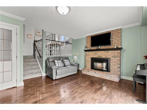 2203 Hunt Crescent, Burlington, ON - Indoor Photo Showing Living Room With Fireplace