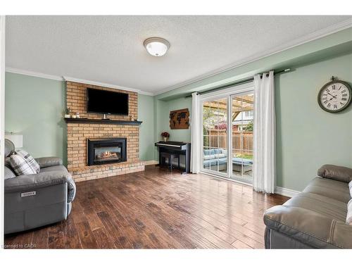 2203 Hunt Crescent, Burlington, ON - Indoor Photo Showing Living Room With Fireplace