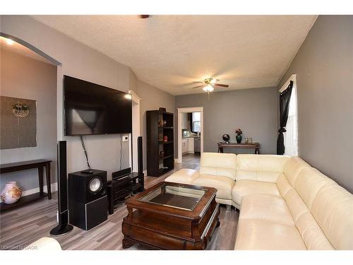 56 Kinrade Avenue, Hamilton, ON - Indoor Photo Showing Living Room With Fireplace