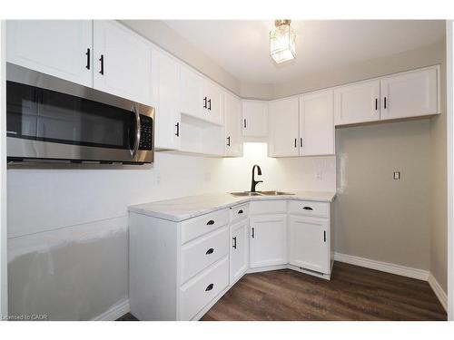 107-360 Waterloo Avenue, Guelph, ON - Indoor Photo Showing Kitchen With Double Sink