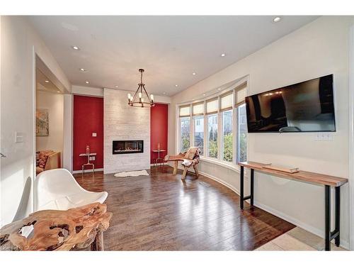 150 Holland Circle, Cambridge, ON - Indoor Photo Showing Living Room With Fireplace