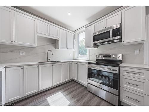 354 Cumberland Avenue, Hamilton, ON - Indoor Photo Showing Kitchen With Double Sink