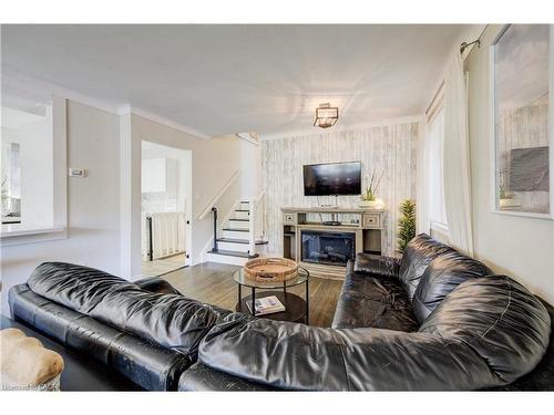 4 Jill Court, St. Catharines, ON - Indoor Photo Showing Living Room With Fireplace