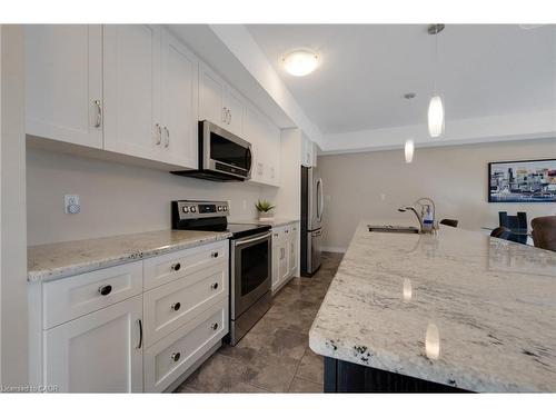 E7-70 Willowrun Drive, Kitchener, ON - Indoor Photo Showing Kitchen With Stainless Steel Kitchen