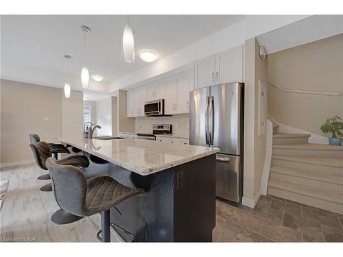 E7-70 Willowrun Drive, Kitchener, ON - Indoor Photo Showing Kitchen With Stainless Steel Kitchen With Upgraded Kitchen
