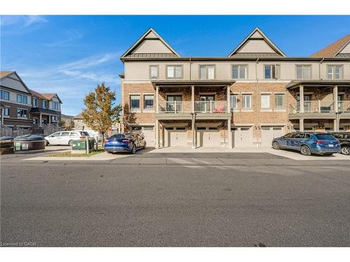E7-70 Willowrun Drive, Kitchener, ON - Outdoor With Balcony With Facade