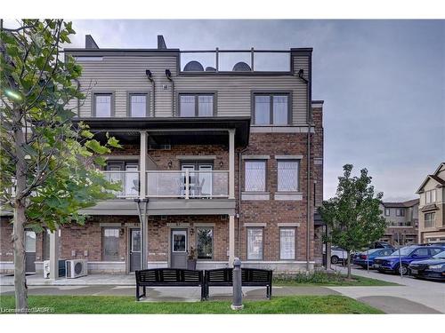 E7-70 Willowrun Drive, Kitchener, ON - Outdoor With Balcony With Facade