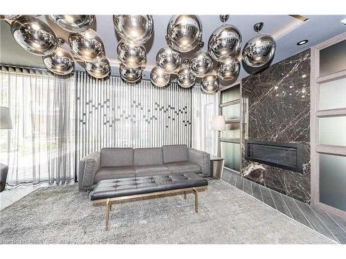 311-210 Sabina Drive, Oakville, ON - Indoor With Fireplace