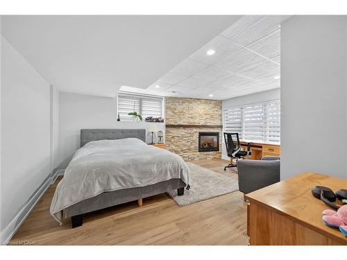 397 Caithness Street E, Caledonia, ON - Indoor Photo Showing Bedroom With Fireplace