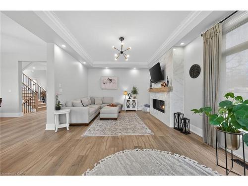 397 Caithness Street E, Caledonia, ON - Indoor Photo Showing Living Room With Fireplace