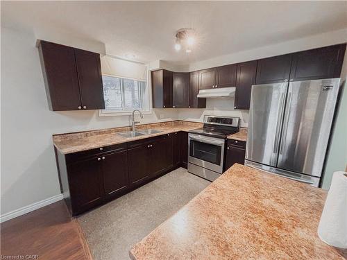 1-26 Woodfern Court, Kitchener, ON - Indoor Photo Showing Kitchen With Double Sink