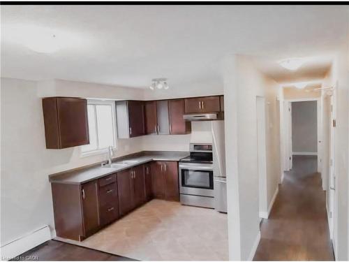 1-26 Woodfern Court, Kitchener, ON - Indoor Photo Showing Kitchen With Double Sink