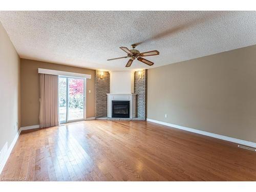 162 Solomon Crescent, Hamilton, ON - Indoor Photo Showing Living Room With Fireplace