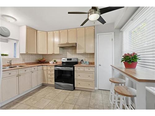 9-55 Kerman Avenue, Grimsby, ON - Indoor Photo Showing Kitchen With Double Sink