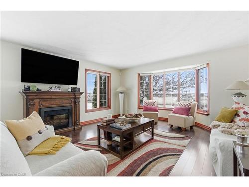 3810 River Road, Caledonia, ON - Indoor Photo Showing Living Room With Fireplace
