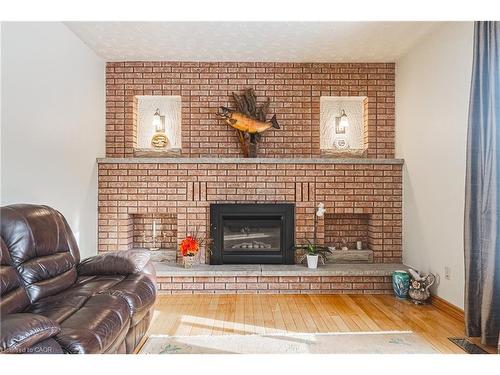 19 Hadeland Avenue, Hamilton, ON - Indoor Photo Showing Living Room With Fireplace