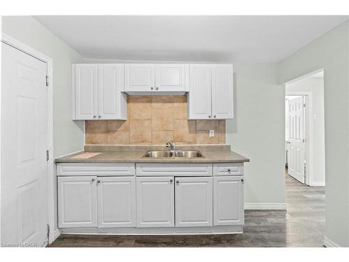 18 Barnesdale Avenue N, Hamilton, ON - Indoor Photo Showing Kitchen With Double Sink