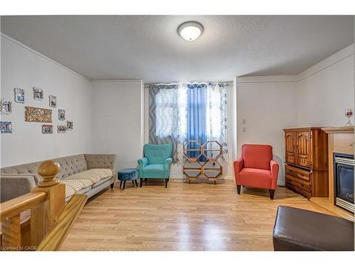 16 Jessica Street, Hamilton, ON - Indoor Photo Showing Living Room With Fireplace