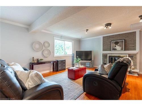 16 Flamingo Drive, Hamilton, ON - Indoor Photo Showing Living Room With Fireplace