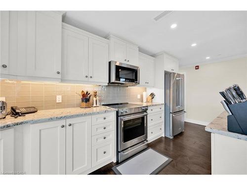 408-10 Concord Place, Grimsby, ON - Indoor Photo Showing Kitchen With Upgraded Kitchen