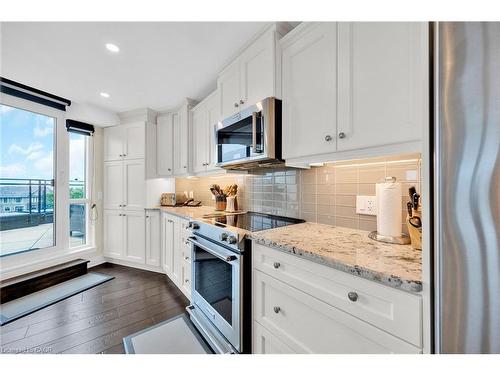 408-10 Concord Place, Grimsby, ON - Indoor Photo Showing Kitchen With Upgraded Kitchen