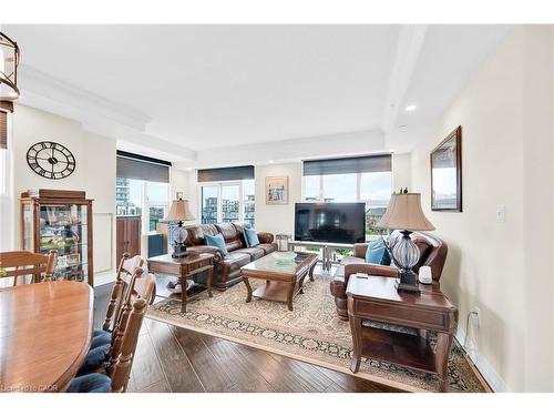 408-10 Concord Place, Grimsby, ON - Indoor Photo Showing Living Room With Fireplace
