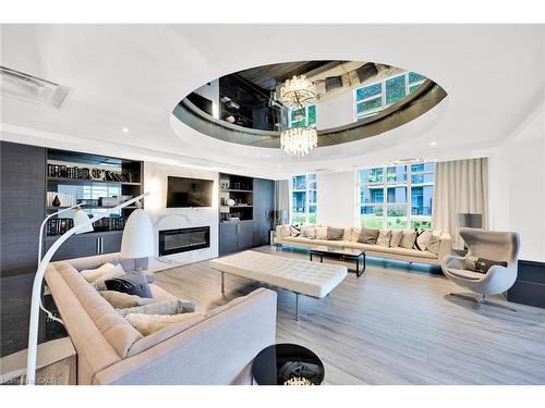 408-10 Concord Place, Grimsby, ON - Indoor With Fireplace